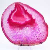 Polerad skiva av rosafärgad agat