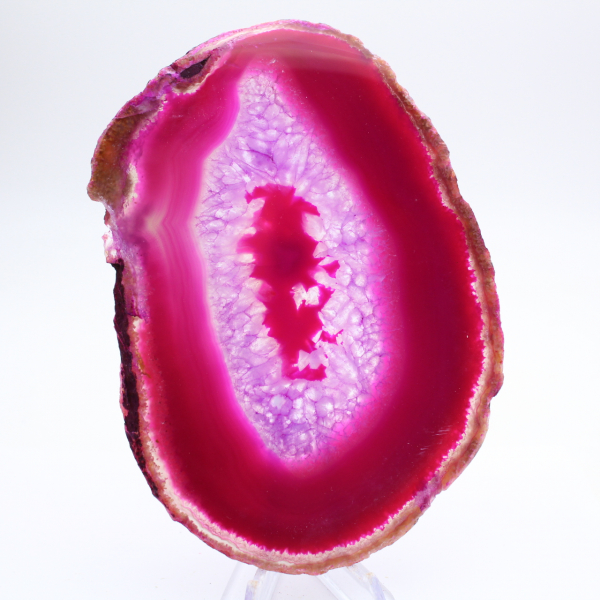 Polerad skiva av färgad rosa agat