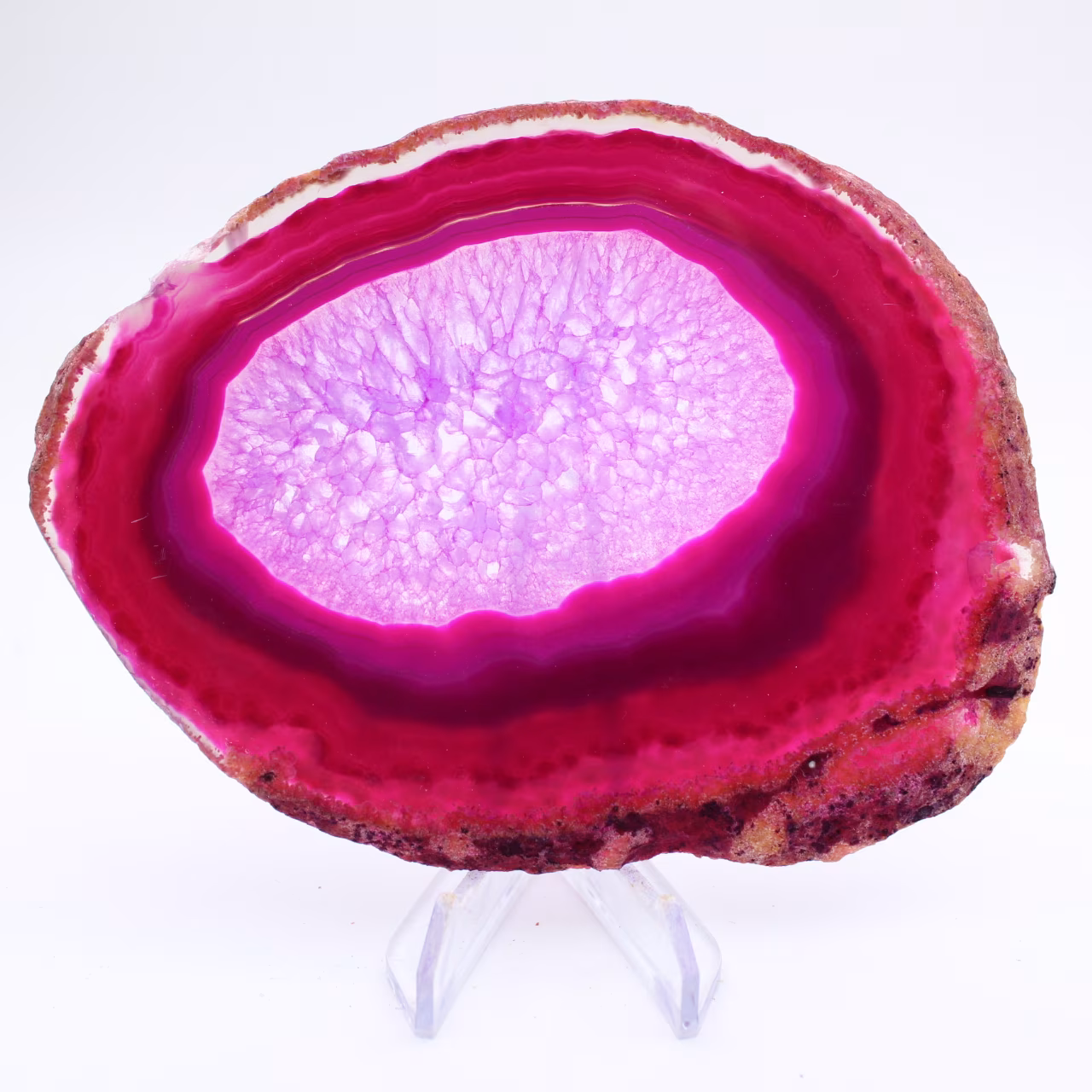 Dekorativ skiva av färgad rosa agat