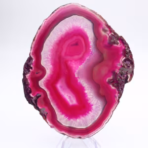Skiva av naturlig rosa tonad agat