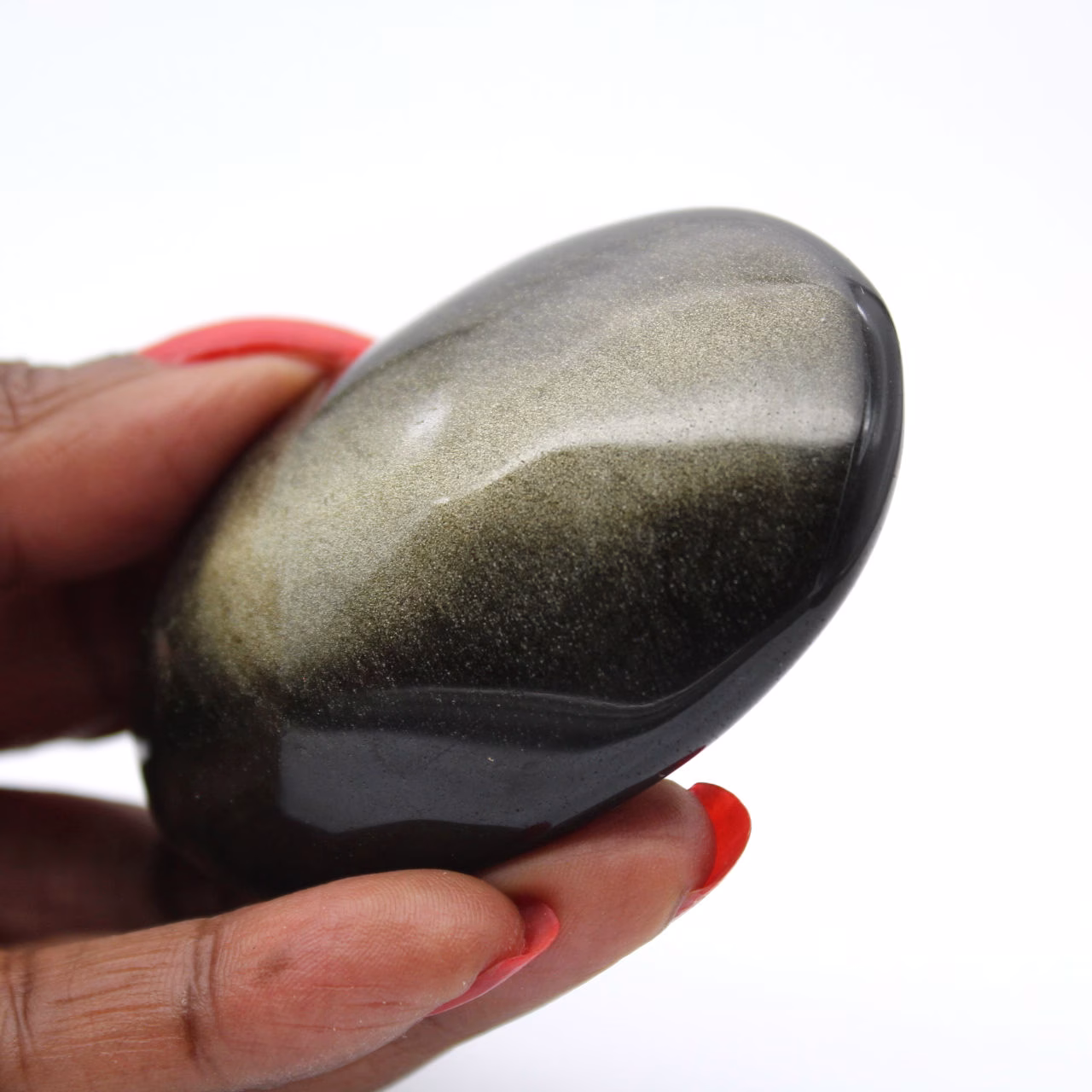 Sten av gyllene mexikansk obsidian, polerat exemplar på 85 g