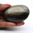 Polerad sten av gyllene mexikansk obsidian, format på 80 g